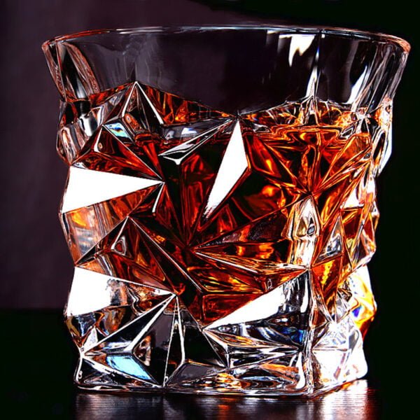 Enthusiast enjoying a moment with their preferred drink in the whisky glass